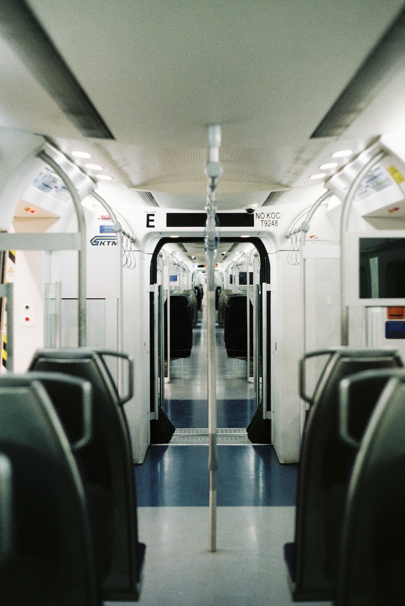 a view of a subway car from the inside